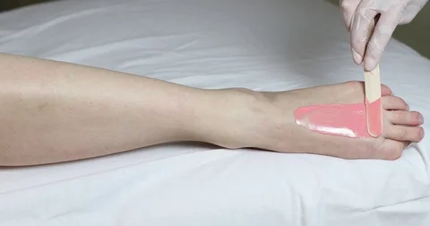 Process depilation female legs and hands Stock Footage 72828762