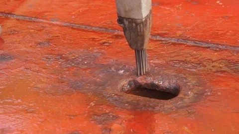 Process of derusting, paint and rust removal by pneumatic chisel from ship deck  Stock Footage 127164489