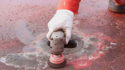 Process of derusting, paint and rust removal by pneumatic grinder from ship deck Stock Footage 127165006