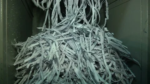 The process of destruction of paper documents on an industrial shredder Stock Footage 105132700