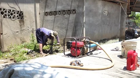 The process of digging a drilled well using the traditional method Stock Footage 252596552