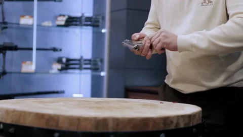 Process of disassembling of a gun. Video. Adult man disassembling a gun very Stock Footage 153665613