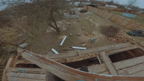 The process of dismantling a house, dismantling a private house Stock Footage 321878232