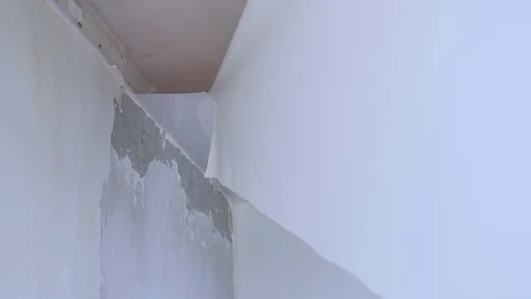 Process of dismantling of stretch suspended ceiling in flat, closeup view. Stock Footage 123346180
