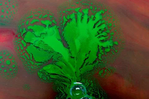 Process of dissolving acrylic paint into water. Amazing abstract background Stock Illustration
