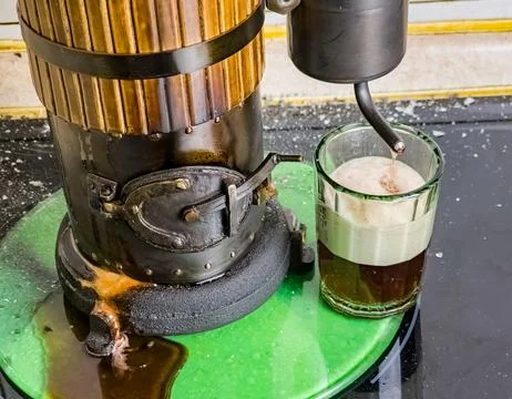 The process of distilling wine at a mini distillery using wood. Volume 400 ml Stock Photos