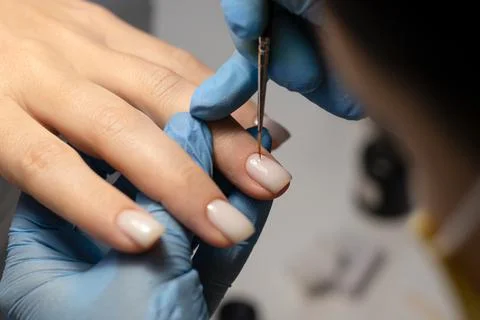 The process of doing a manicure in a spa salon. Stock Photos