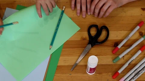 In the process of draw on paper and prepare materials for creating toys Stock Footage 127646586