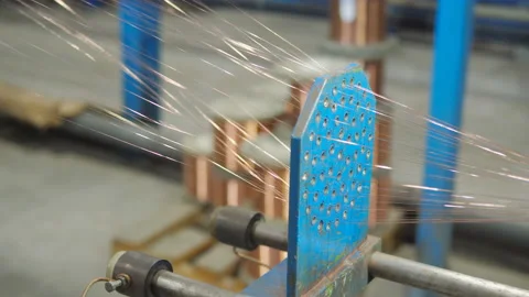 The process of drawing copper wire at a cable production plant. Thin strands of Video stock 125142161