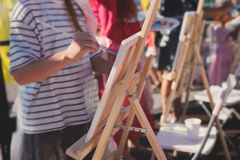 Process of drawing, group class of talented students with painting easels a.. Stock Photos