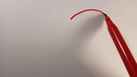 The process of drawing a symbolic red heart, boy and girl. Symbol of love Stock Footage 104988052