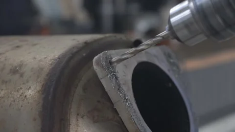 The process of drilling metal at a car service station. Stock Footage 252533917