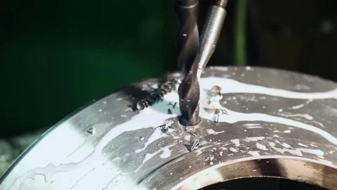 Process of drilling metal with coolant Stock Footage 82719936