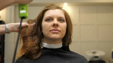 Process of drying the head in a barbershop Stock Footage 149934744
