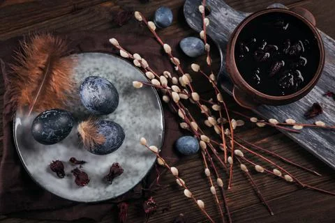 Process of dyeing eggs with natural paints for Easter. Stock Photos