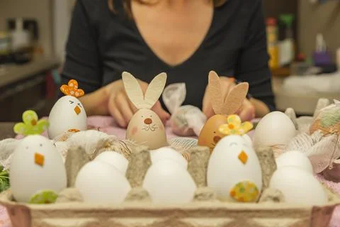 The process of dyeing eggs into onion skins. Ecological coloring of eggs for  Stock Photos