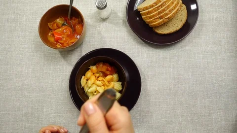 The process of eating pasta with lecho sauce. Stock Footage 104190545