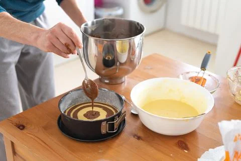 Process of elaboration of zebra cake. Stock Photos