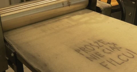 The Process of Engraving Making is Shown by a Man Dressed in a Long Apron and Stock Footage 53376056