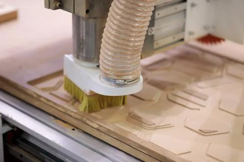 Process of engraving MDF panel with a CNC router Stock Photos