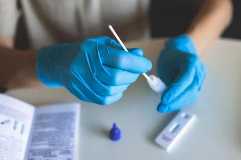 Process of express fast coronavirus covid Antigen AG PCR testing examination  Stock Photos