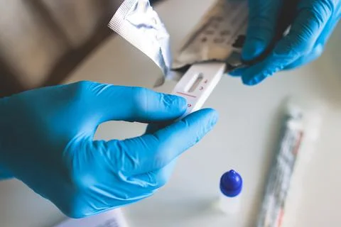 Process of express fast coronavirus covid Antigen AG PCR testing examination  Stock Photos