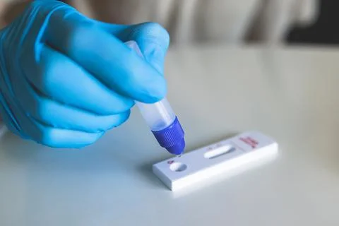 Process of express fast coronavirus covid Antigen AG PCR testing examination  Stock Photos