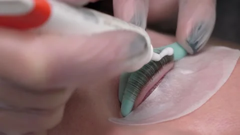 Process of extension eyelashes Stock Footage 153017026