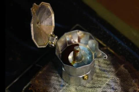 The process of extracting coffee into espresso using mocha pots, boiling wate Stock Photos