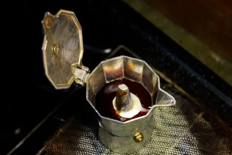 The process of extracting coffee into espresso using mocha pots, boiling wate Stock Photos