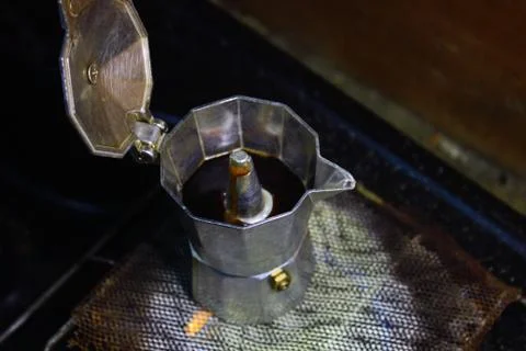 The process of extracting coffee into espresso using mocha pots, boiling wate Stock Photos