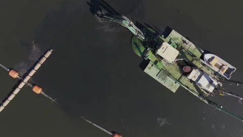Process of extracting sediments using dredging barge Stock Footage 276241393