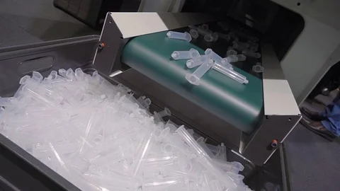 The process of extrusion of the disposable plastic syringes Video stock 72353022