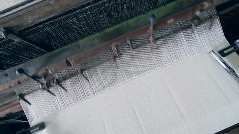 Process of fabric weaving at a modern textile factory. Video stock 105741670