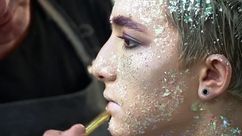 Process of the face art creation for a young man Stock Footage 76582715