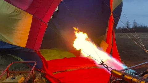 The process of filling a large balloon with warm air from a gas burner Video stock 155482121