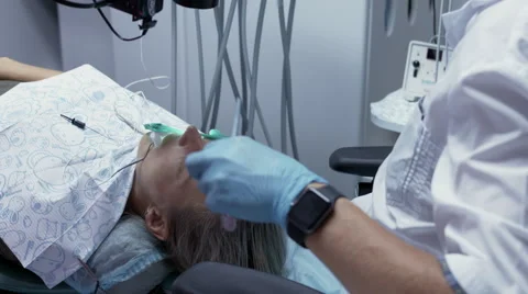 Process of filling of root canals with the help of modern equipment Stock Footage 67561914