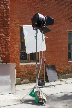 Process of filming. Spotlight illuminates window. Stock Photos