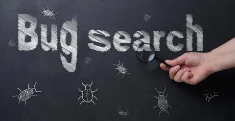 The process of finding and fixing bugs in software code. A person's hand ho.. Stock Photos