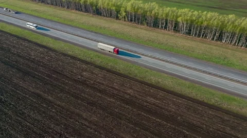 The process of freight and passenger traffic from a large city to the suburbs Stock Footage 154270007