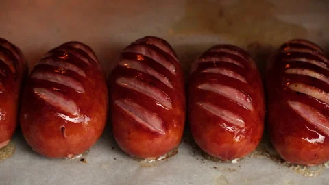 Process fried sausages, close up Stock Footage 246535039