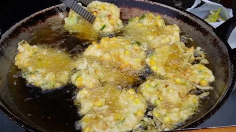 The process of frying Bakwan. Stock Footage 297683026
