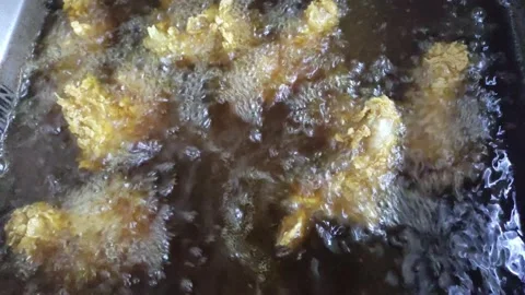 The process of frying crispy chicken. Stock Footage 233419455