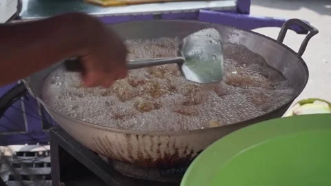 The process of frying fried cassava Stock Footage 217741540