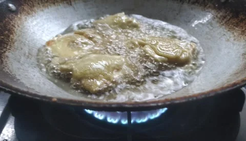 The Process of Frying Tempeh Stock Footage 296207632