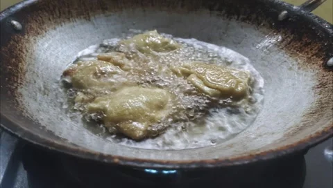 The Process of Frying Tempeh Stock Footage 296207659