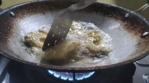 The Process of Frying Tempeh Stock Footage 296207666