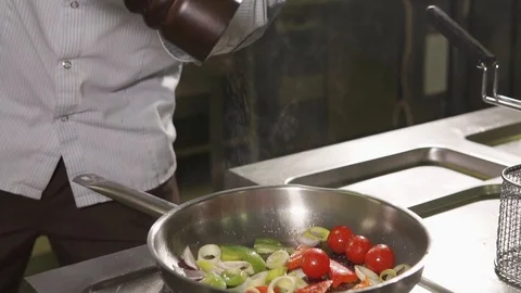 Process of frying vegetables on pan Stock Footage 86447851