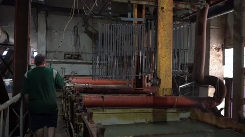 The process of galvanizing metal parts. Galvanic plant Stock Footage 159743799