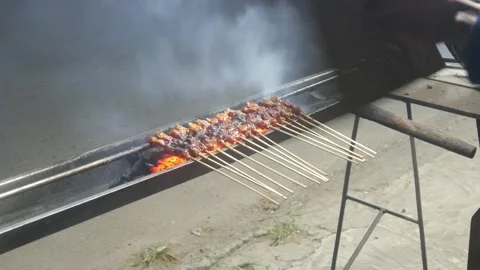 The process of grilling chicken satay Stock Footage 323364869